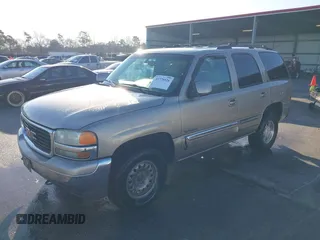 2001 GMC Yukon SLT with VIN 1GKEK13T11R168999, listed as a IAAI auction lot 41778926 with 163,388 mi miles. Bid and sale history available at carsss.com. Image 2.