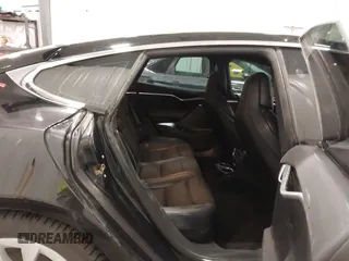 2018 Tesla Model S 75D with VIN 5YJSA1E2XJF248751, listed as a IAAI auction lot 42079081 with 75,904 mi miles and . Bid and sale history available at DreamBid. Image 8.
