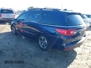 2020 Honda Odyssey Touring with VIN 5FNRL6H89LB015744, listed as a IAAI auction lot 41495735 with 106,440 mi miles and . Bid and sale history available at DreamBid. Image 3.