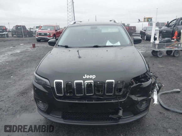 2019 Jeep Cherokee Latitude with VIN 1C4PJLCB1KD339906, listed as a IAAI auction lot 41539248 with 123,243 mi miles and . Bid and sale history available at carsss.com. Image 13.