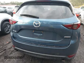 2020 Mazda CX-5 Grand Touring with VIN JM3KFADM4L0827733, listed as a IAAI auction lot 41482517 with 43,597 mi miles. Bid and sale history available at carsss.com. Image 16.