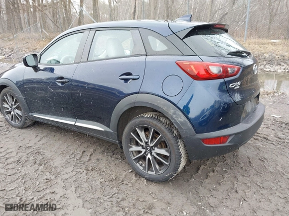 2017 Mazda CX-3 Grand Touring with VIN JM1DKFD75H0179167, listed as a IAAI auction lot 41980243 with 69,076 mi miles. Bid and sale history available at carsss.com. Image 3.