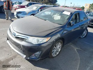 2014 Toyota Camry Hybrid LE with VIN 4T1BD1FK5EU106743, listed as a IAAI auction lot 41323019 with 84,511 mi miles. Bid and sale history available at carsss.com. Image 19.