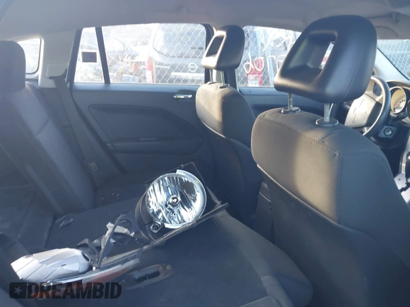 2008 Dodge Caliber SE with VIN 1B3HB28BX8D779508, listed as a IAAI auction lot 40913838 with Not Provided miles and . Bid and sale history available at DreamBid. Image 8.