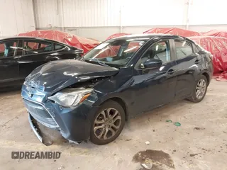 2016 Scion iA z VIN 3MYDLBZV5GY103533, wystawiony jako IAAI lot #41756270 z przebiegiem 59 290 mil mil oraz . Historia ofert i sprzedaży dostępna na DreamBid. Obrazek 2.