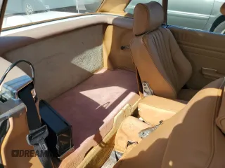 1986 Mercedes-Benz 560 SL z VIN WDBBA48D8GA045467, wystawiony jako Copart lot #57576155 z przebiegiem 64 819 mil mil oraz Tytuł czysty. Historia ofert i sprzedaży dostępna na DreamBid. Obrazek 10.