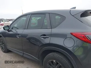 2016 Mazda CX-5 Sport with VIN JM3KE2BY4G0858100, listed as a IAAI auction lot 41368135 with 93,435 mi miles. Bid and sale history available at carsss.com. Image 14.