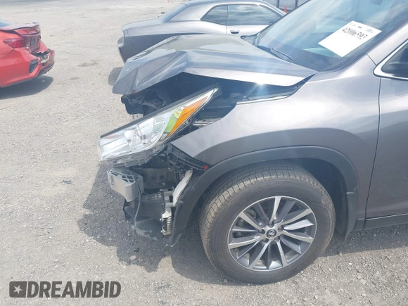 2019 Toyota Highlander SE with VIN 5TDKZRFH3KS353087, listed as a IAAI auction lot 42006593 with 74,214 mi miles and . Bid and sale history available at DreamBid. Image 18.