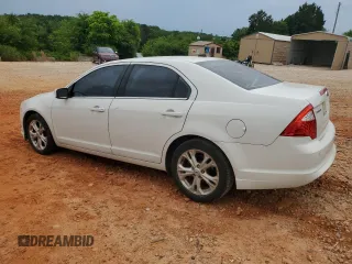 2012 Ford Fusion SE z VIN 3FAHP0HAXCR132060, wystawiony jako Copart lot #56148395 z przebiegiem 172 160 mil mil oraz Czysty tytuł • Clean title. Historia ofert i sprzedaży dostępna na DreamBid. Obrazek 2.
