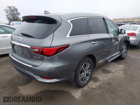 2019 Infiniti QX60 Luxe with VIN 5N1DL0MN9KC569666, listed as a IAAI auction lot 41904215 with 44,410 mi miles and . Bid and sale history available at DreamBid. Image 4.
