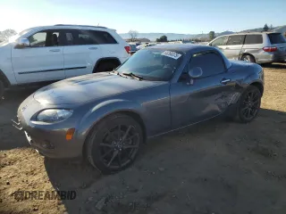 2008 Mazda MX-5 Miata Grand Touring z VIN JM1NC26F680156043, wystawiony jako Copart lot #88269375 z przebiegiem 135 749 mil mil oraz Szkoda całkowita • Salvage title. Historia ofert i sprzedaży dostępna na DreamBid. Obrazek 1.