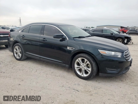 2014 Ford Taurus SEL z VIN 1FAHP2E84EG133955, wystawiony jako Copart lot #56630155 z przebiegiem 113 045 mil mil oraz Szkoda całkowita • Salvage title. Historia ofert i sprzedaży dostępna na DreamBid. Obrazek 4.