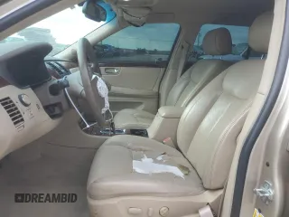 2006 Cadillac DTS 1SC z VIN 1G6KD57Y06U187282, wystawiony jako Copart lot #72627494 z przebiegiem 142 191 mil mil oraz Szkoda całkowita • Salvage title. Historia ofert i sprzedaży dostępna na DreamBid. Obrazek 7.