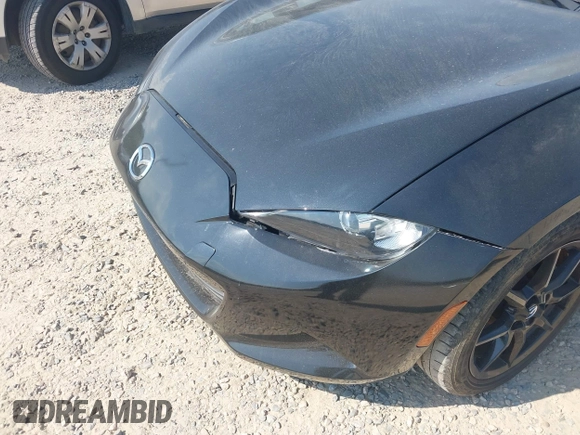 2021 Mazda MX-5 Miata Sport with VIN JM1NDAB73M0454064, listed as a IAAI auction lot 42613537 with 24,630 mi miles and . Bid and sale history available at DreamBid. Image 6.