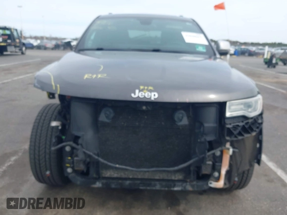 2016 Jeep Grand Cherokee Limited 75th Anniversary with VIN 1C4RJFBG5GC497766, listed as a IAAI auction lot 42048662 with 164,281 mi miles and . Bid and sale history available at DreamBid. Image 6.