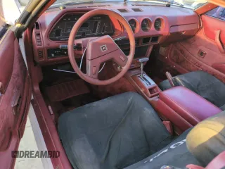 1983 Datsun 280ZX z VIN JN1HZ04S2DX564639, wystawiony jako Copart lot #75222314 z przebiegiem 75 925 mil mil oraz Szkody całkowita. Historia ofert i sprzedaży dostępna na DreamBid. Obrazek 8.
