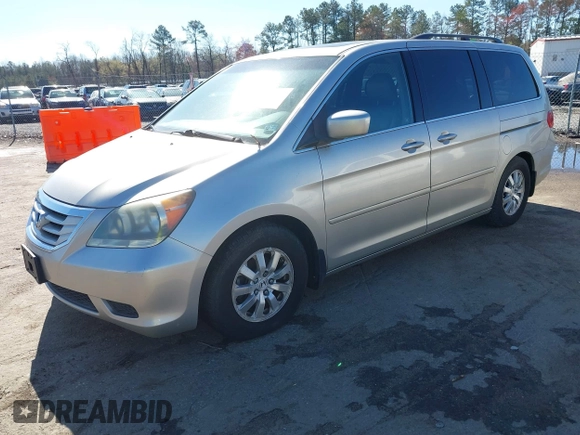 2008 Honda Odyssey EX-L with VIN 5FNRL38708B110657, listed as a IAAI auction lot 41854985 with 253,985 mi miles and . Bid and sale history available at carsss.com. Image 2.