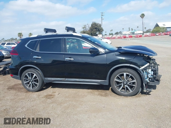 2019 Nissan Rogue SL with VIN 5N1AT2MT1KC833220, listed as a IAAI auction lot 42179936 with 82,232 mi miles and . Bid and sale history available at DreamBid. Image 14.