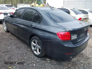2013 BMW 3 Series 328i with VIN WBA3C1G50DNN93327, listed as a IAAI auction lot 41865009 with 175,371 mi miles and . Bid and sale history available at carsss.com. Image 3.