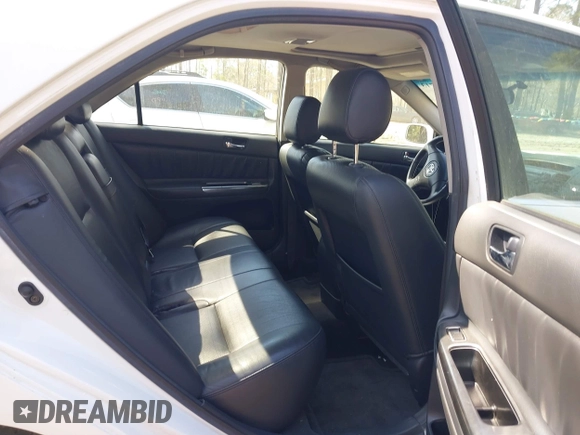 2003 Toyota Camry LE z VIN JTDBF30K930147772, wystawiony jako IAAI lot #41768713 z przebiegiem 231 537 mil mil oraz . Historia ofert i sprzedaży dostępna na DreamBid. Obrazek 8.