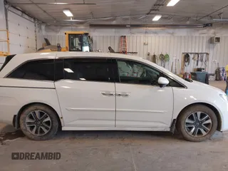 2015 Honda Odyssey Touring Elite with VIN 5FNRL5H97FB060060, listed as a IAAI auction lot 41829864 with Not Provided miles and . Bid and sale history available at DreamBid. Image 12.