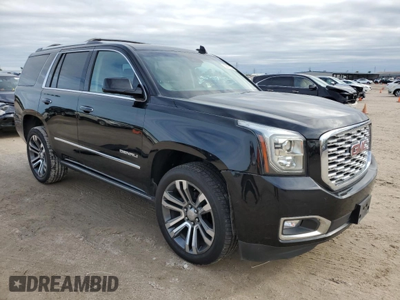 2018 GMC Yukon Denali with VIN 1GKS1CKJ8JR201028, listed as a Copart auction lot 83478394 with 133,302 mi miles and Salvage Title. Bid and sale history available at carsss.com. Image 4.