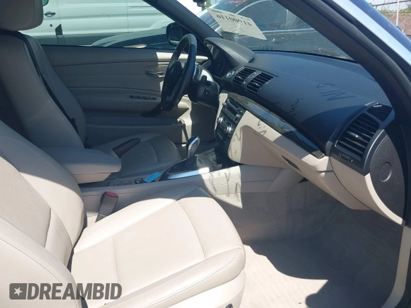2013 BMW 1 Series 135i with VIN WBAUN7C57DVM28236, listed as a IAAI auction lot 41900116 with 38,876 mi miles and . Bid and sale history available at carsss.com. Image 5.