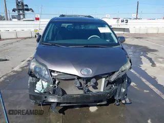 2012 Toyota Sienna SE with VIN 5TDXK3DCXCS233593, listed as a IAAI auction lot 41959611 with 85,558 mi miles. Bid and sale history available at carsss.com. Image 13.