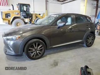 2017 Mazda CX-3 Grand Touring z VIN JM1DKFD74H0163736, wystawiony jako Copart lot #57871265 z przebiegiem 212 515 mil mil oraz Szkody całkowita. Historia ofert i sprzedaży dostępna na DreamBid. Obrazek 1.