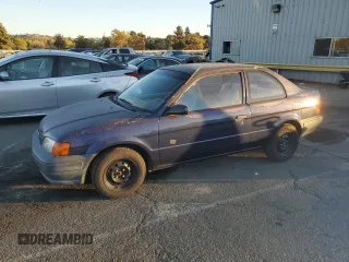 1996 Toyota Tercel DX z VIN JT2AC52L5T0190097, wystawiony jako Copart lot #76574844 z przebiegiem 175 256 mil mil oraz Tytuł czysty. Historia ofert i sprzedaży dostępna na DreamBid. Obrazek 1.