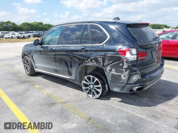 2016 BMW X5 xDrive50i with VIN 5UXKR6C51G0J81658, listed as a IAAI auction lot 41801382 with 34,572 mi miles. Bid and sale history available at carsss.com. Image 3.