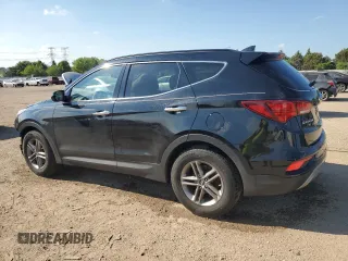 2017 Hyundai Santa Fe 2.4L z VIN 5NMZUDLB1HH034797, wystawiony jako Copart lot #56834465 z przebiegiem 47 528 mil mil oraz Szkoda całkowita • Salvage title. Historia ofert i sprzedaży dostępna na DreamBid. Obrazek 2.