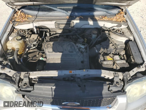 2004 Ford Escape Limited with VIN 1FMCU041X4KA45604, listed as a Copart auction lot 80974334 with 88,687 mi miles and Salvage title. Bid and sale history available at DreamBid. Image 14.