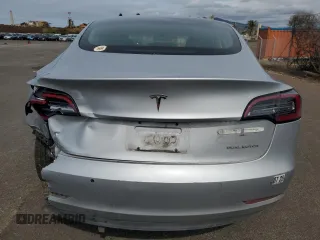 2018 Tesla Model 3 Long Range Battery with VIN 5YJ3E1EB8JF091116, listed as a Copart auction lot 43281485 with 58,677 mi miles and Salvage Title. Bid and sale history available at DreamBid. Image 6.