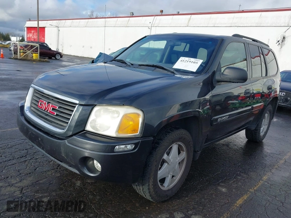 2003 GMC Envoy SLT with VIN 1GKDT13S732283859, listed as a IAAI auction lot 41219105 with 172,953 mi miles. Bid and sale history available at carsss.com. Image 18.