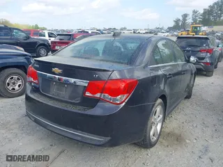 2015 Chevrolet Cruze LT with VIN 1G1PE5SB6F7101516, listed as a IAAI auction lot 41968922 with 161,818 mi miles. Bid and sale history available at carsss.com. Image 4.