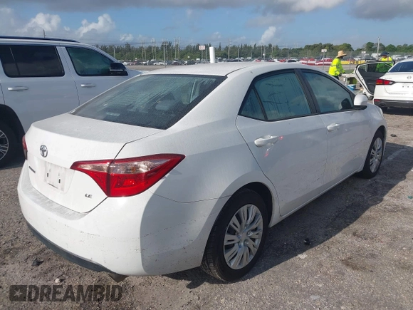 2019 Toyota Corolla L with VIN 2T1BURHE0KC179280, listed as a IAAI auction lot 41944624 with 102,964 mi miles. Bid and sale history available at carsss.com. Image 4.