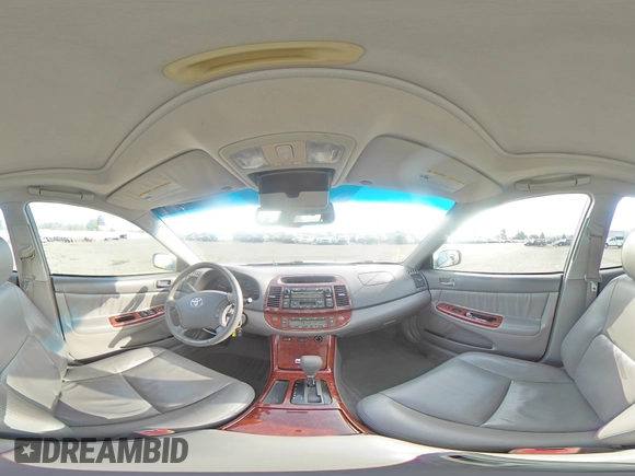 2006 Toyota Camry LE z VIN 4T1BF30KX6U630387, wystawiony jako Copart lot #49624755 z przebiegiem 232 568 mil mil oraz Szkoda całkowita • Salvage title. Historia ofert i sprzedaży dostępna na DreamBid. Obrazek 13.