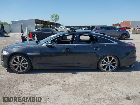 2015 Jaguar XJ R-Sport with VIN SAJWJ1CD6F8V83990, listed as a IAAI auction lot 41936162 with Not Provided miles and . Bid and sale history available at DreamBid. Image 14.