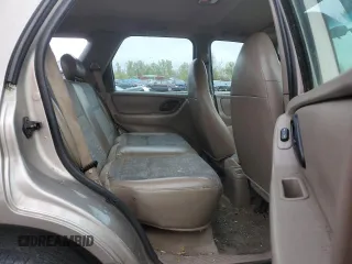 2001 Ford Escape XLS with VIN 1FMYU02111KA37010, listed as a Copart auction lot 52328415 with 312,425 mi miles and Salvage title. Bid and sale history available at DreamBid. Image 11.