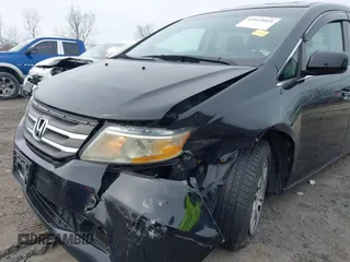 2012 Honda Odyssey EX-L with VIN 5FNRL5H63CB070361, listed as a IAAI auction lot 42025024 with 152,258 mi miles and . Bid and sale history available at carsss.com. Image 6.