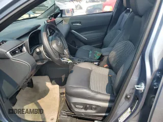 2023 Toyota Corolla Cross Hybrid S with VIN 7MUFBABG6PV014406, listed as a Copart auction lot 59944835 with 8,252 mi miles and Salvage title. Bid and sale history available at DreamBid. Image 7.