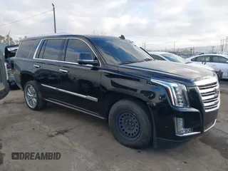 2018 Cadillac Escalade Platinum z VIN 1GYS4DKJ3JR200016, wystawiony jako IAAI lot #41367220 z przebiegiem 105 043 mil mil oraz . Historia ofert i sprzedaży dostępna na DreamBid. Obrazek 1.