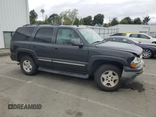 2005 Chevrolet Tahoe Z71 with VIN 1GNEC13T85R141076, listed as a Copart auction lot 54733415 with 310,992 mi miles and Salvage title. Bid and sale history available at DreamBid. Image 4.