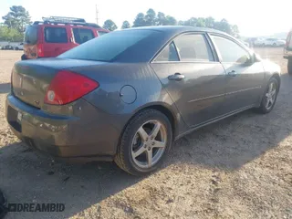 2006 Pontiac G6 GT with VIN 1G2ZH578164171631, listed as a IAAI auction lot 41945854 with 137,457 mi miles. Bid and sale history available at carsss.com. Image 4.