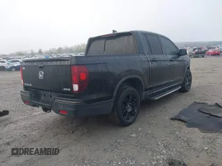 2019 Honda Ridgeline Black Edition with VIN 5FPYK3F87KB029017, listed as a IAAI auction lot 41876145 with 95,740 mi miles and . Bid and sale history available at DreamBid. Image 4.