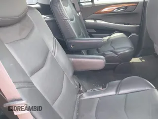 2015 Cadillac Escalade Luxury z VIN 1GYS4BKJ1FR215223, wystawiony jako IAAI lot #42548931 z przebiegiem 145 947 mil mil oraz . Historia ofert i sprzedaży dostępna na DreamBid. Obrazek 8.