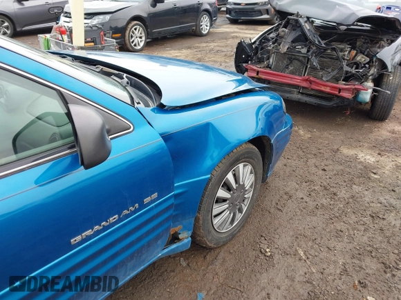1999 Pontiac Grand Am SE2 с VIN 1G2NE52T2XM904094, выставлен на аукционе IAAI как лот 41746997 с пробегом Не указан миль и . История ставок и продаж доступна на DreamBid. Изображение 6.