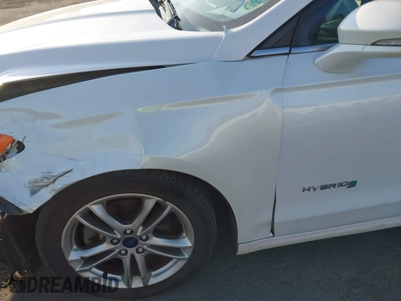 2015 Ford Fusion SE Hybrid with VIN 3FA6P0LU2FR305597, listed as a IAAI auction lot 42168292 with 97,688 mi miles and . Bid and sale history available at DreamBid. Image 13.