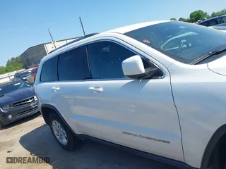 2014 Jeep Grand Cherokee Laredo with VIN 1C4RJEAG2EC107005, listed as a IAAI auction lot 41970670 with 299,211 mi miles. Bid and sale history available at carsss.com. Image 13.